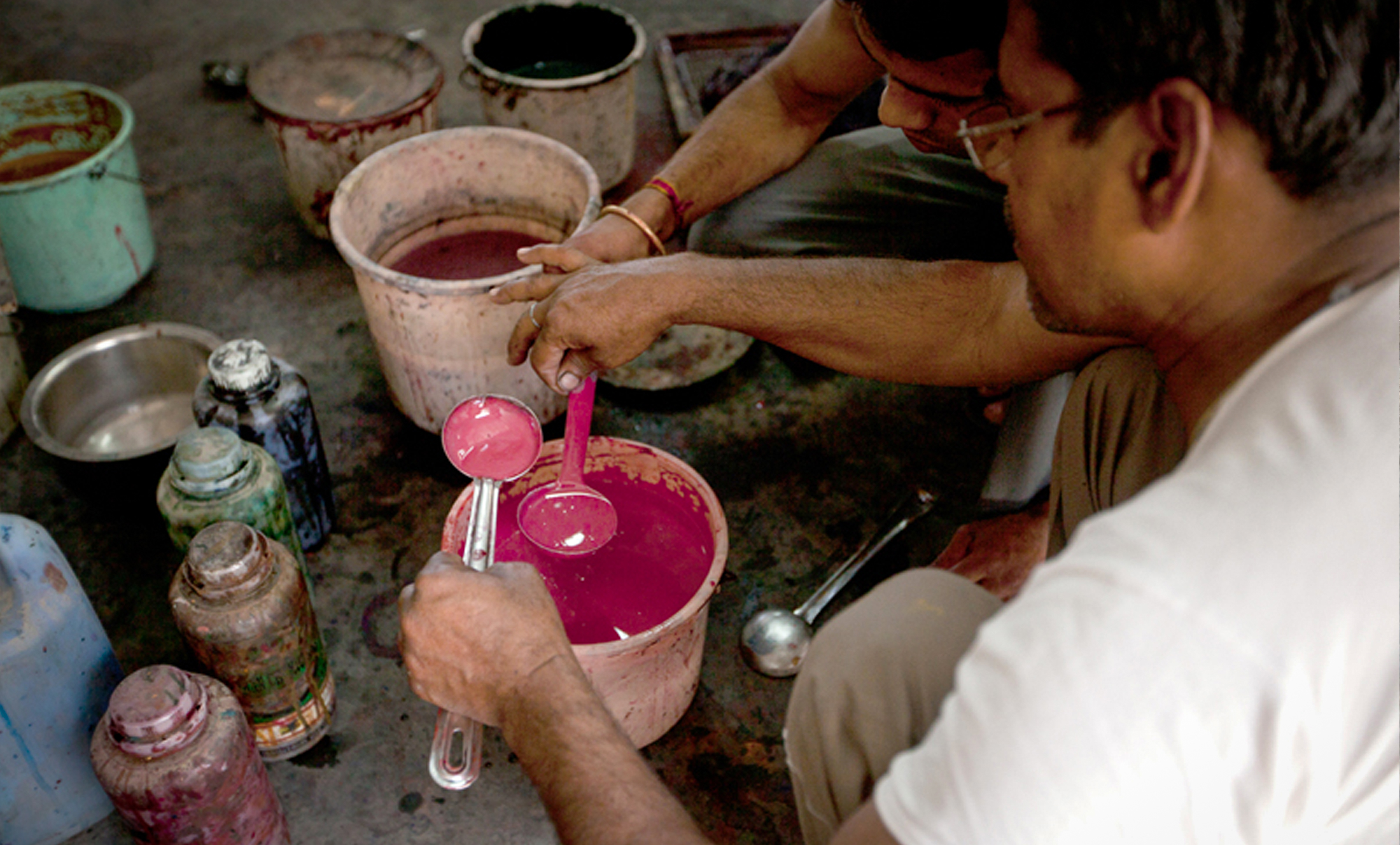 Dyes are prepared and balanced before printing starts.