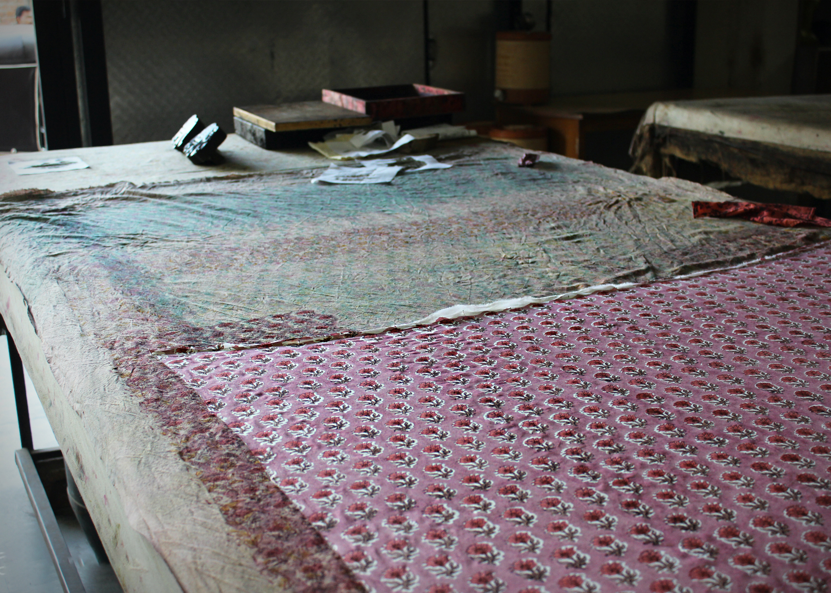 Printing moves carefully from left to right across the fabric.